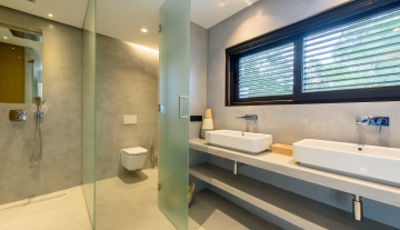 Resa Estates Ibiza villa for sale es Cubells modern heated pool bathroom.jpg